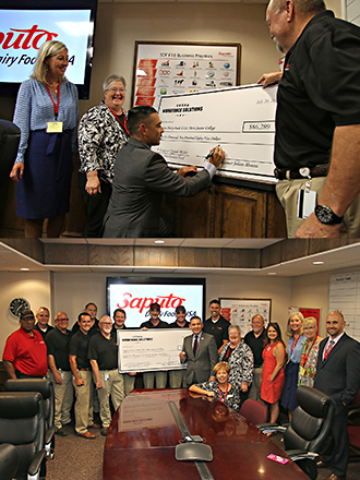 Texas Workforce Commission check signing photo