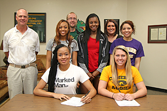 Volleyball players signing photo