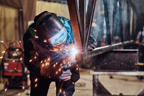 person welding