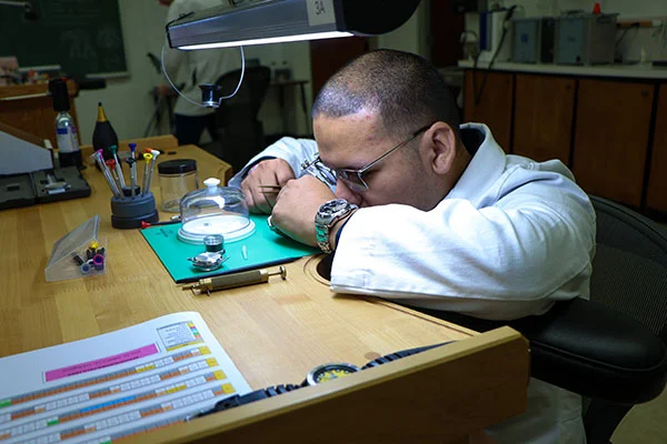 Watch maker at bench