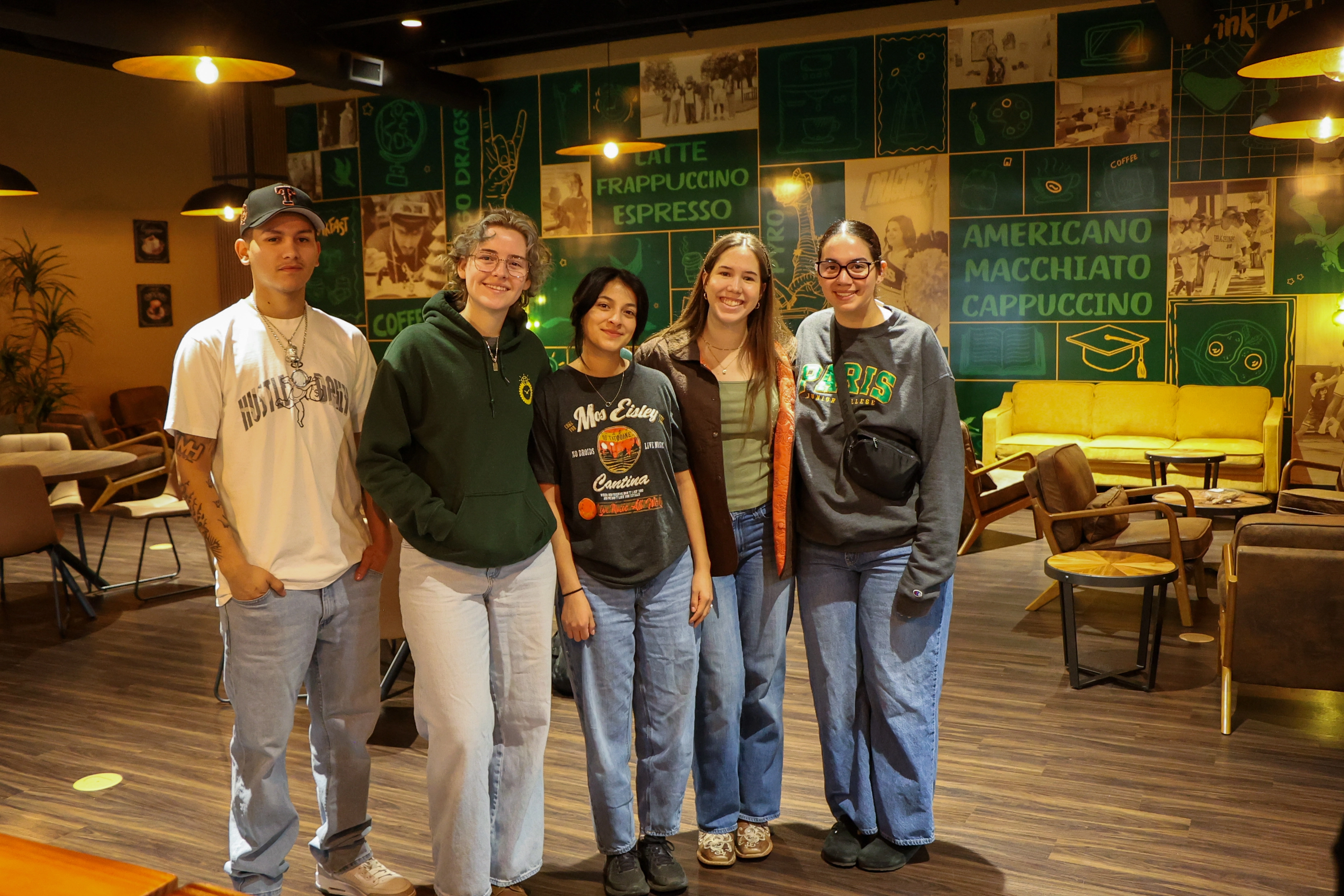 Students taking a picture inside Dragons Lair